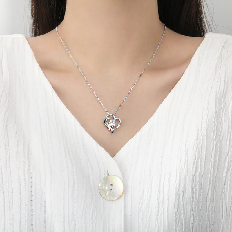 Collier femme avec double cœur et zircons – réglable