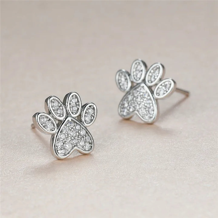 Boucles d'oreilles en forme de papillon avec une patte de chat et zircone blanche