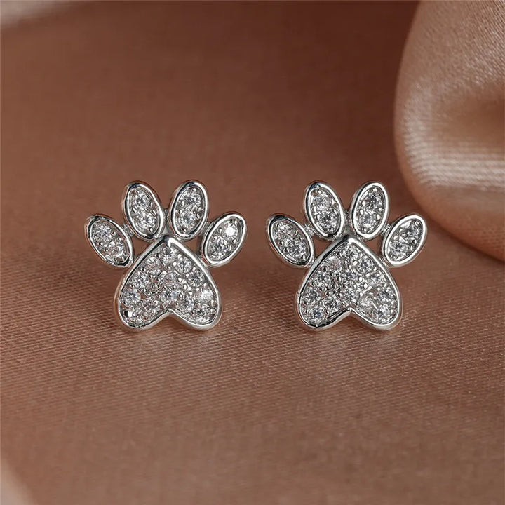 Boucles d'oreilles en forme de papillon avec une patte de chat et zircone blanche