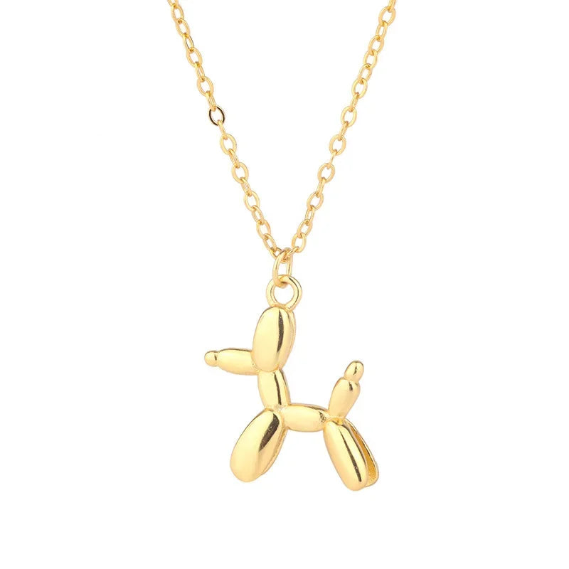 Collier chien avec ballon – Bijou ludique pour femme avec pendentif animal en look doré